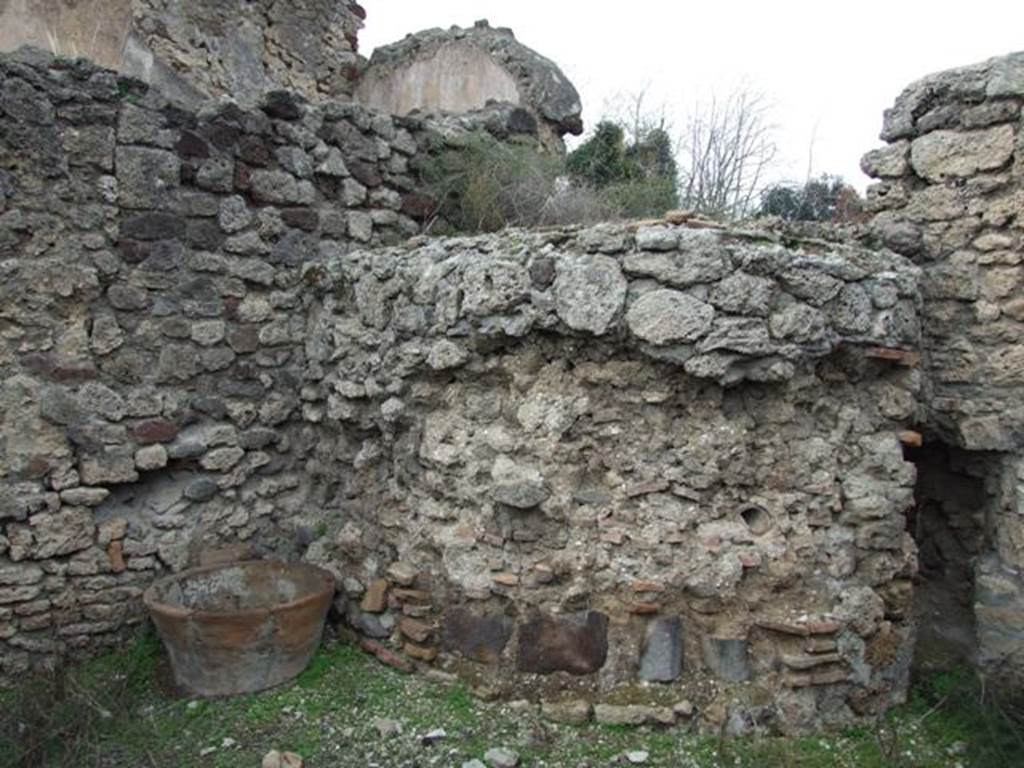 V.3.8 Pompeii. December 2007. Large room behind oven. Rear of oven.