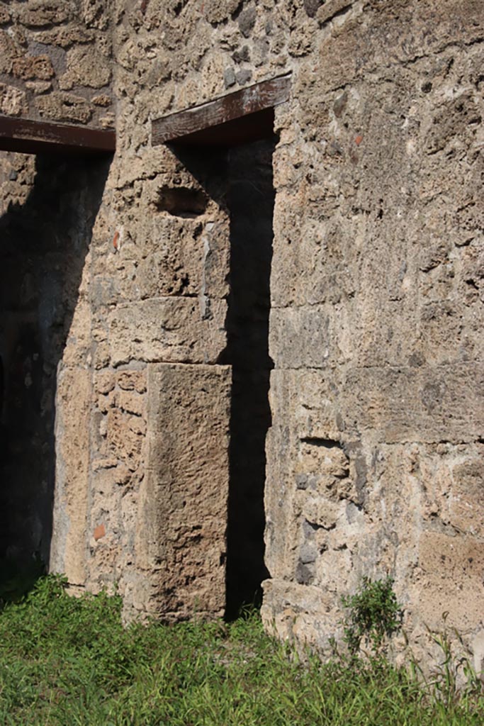 V.3.8 Pompeii. October 2023.
Doorway into room in north-east corner of atrium. Photo courtesy of Klaus Heese.