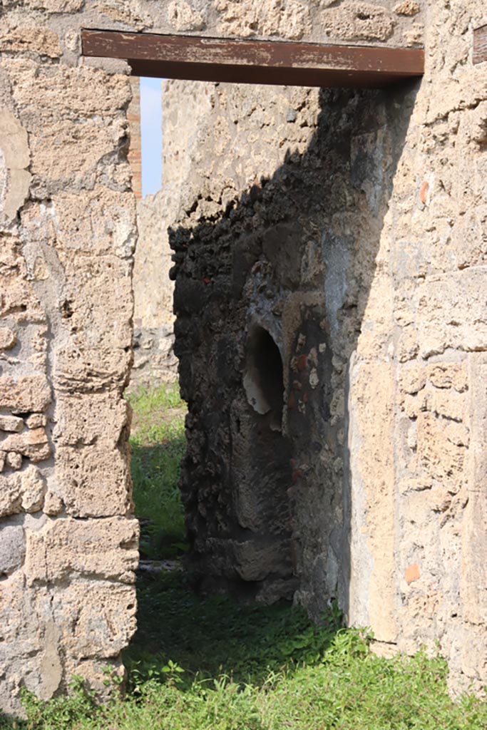 V.3.8 Pompeii. October 2023.
Looking north through corridor in north-east corner of atrium. Photo courtesy of Klaus Heese.