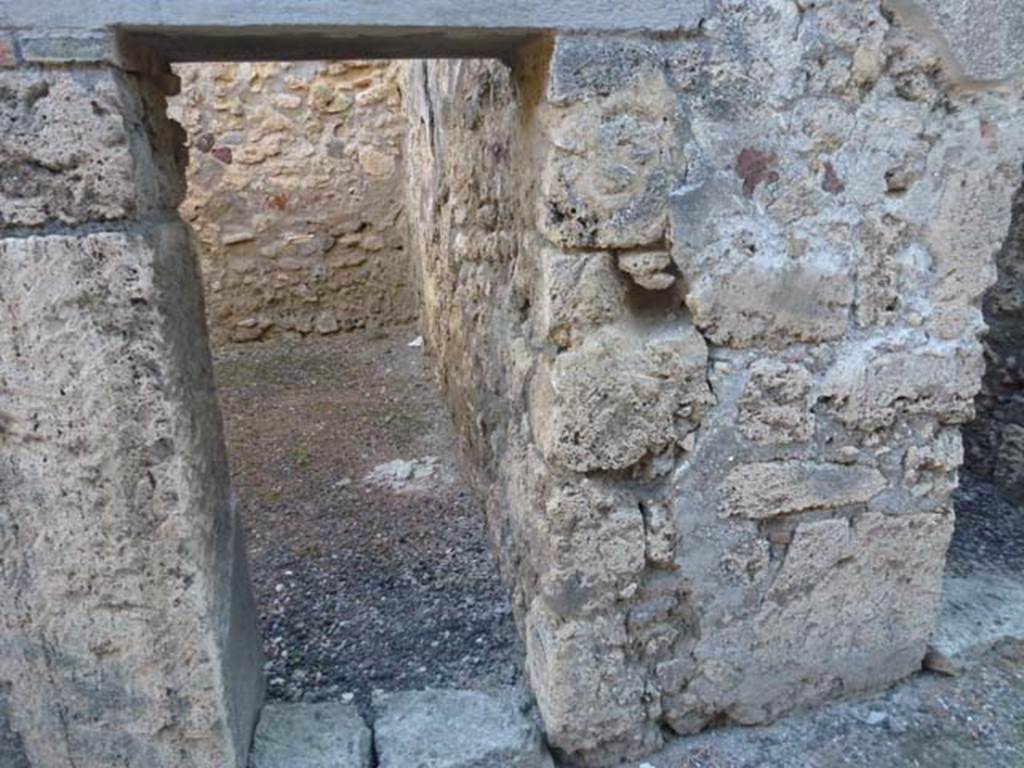 V.3.8 Pompeii. June 2012. Doorway to front room on west side of entrance corridor.
Photo courtesy of Michael Binns.