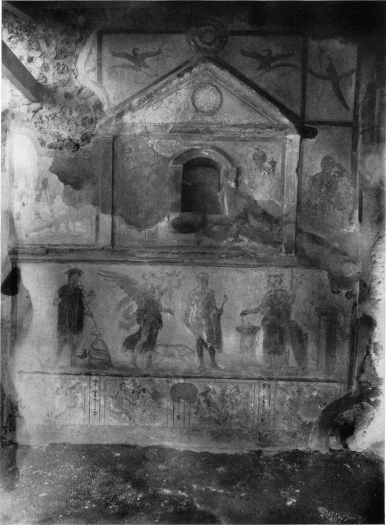 V.4.3 Pompeii. c.1930s. Lararium painting from west wall of atrium.
Hercules with club and lion skin is in the centre.
Also recognisable on the left was Mercury and next to Mercury was a crowing cock.
From left to right were an omphalos with a snake, Victoria with spread wings, a pig, Hercules and Minerva sacrificing at an altar, with her shield and owl.
At the sides of the niche were paintings of the gods.
To the right of the niche was Fortuna but only the head with a small modius and the cornucopia against her left shoulder were visible.
To the left of the niche was Venus Pompeiana dressed in green, her left arm on the steering rudder and an olive branch in her right hand. Amor with a mirror stands to the left, on a base.
Outside the aedicula to the right is Jupiter seated on a throne with his head leaning on his left hand. A sceptre rests on his left shoulder and the thunderbolt is in his right hand.
On the left outside the aedicula is Bacchus with a thyrsus in his left hand and a kantharos in his right pouring wine into the mouth of the panther at his side.
In each of the two triangular panels above the pediment was painted an eagle in flight, holding a palm in its talons.
In the top right above Jupiter is a peacock perched on a garland.
On the aedicula pediment are various figures in stucco relief and a wreath (laurel?).
Above the gable peak is a stucco patera.
See Boyce G. K., 1937. Corpus of the Lararia of Pompeii. Rome: MAAR 14. (p.39, no.118, pl. 25,1).