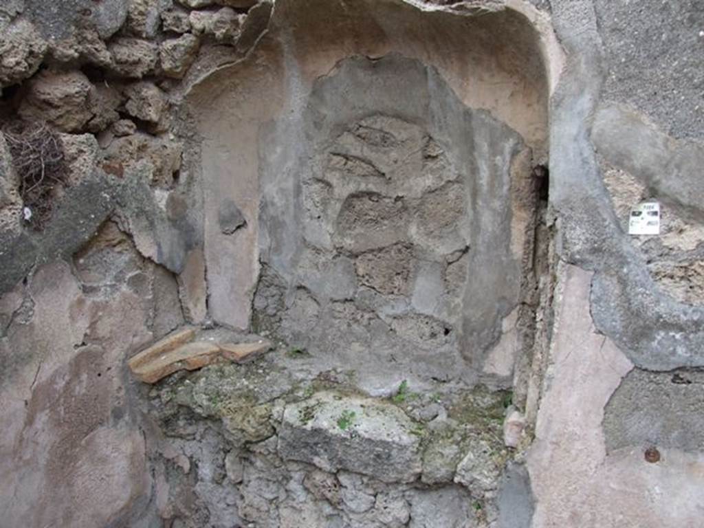 V.4.7 Pompeii. December 2007. Niche on west wall. According to Boyce, this large and shallow arched niche was described by Paribeni (Not. Scavi, 1902, 377) as il larario. However Boyce disagreed and thought it most unlike one.
See Boyce G. K., 1937. Corpus of the Lararia of Pompeii. Rome: MAAR 14. (121; p.40)