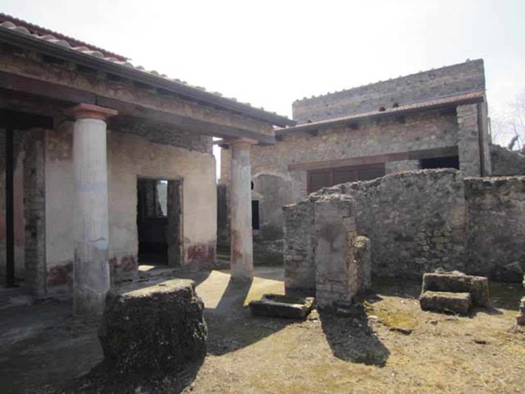 V.4.a Pompeii. March 2012. Looking towards doorway to summer triclinium (centre left) at west end of garden area.
The remains of the kitchen area can be seen on the right, and photos are also to be found in our Garden area pages.
Photo courtesy of Marina Fuxa.