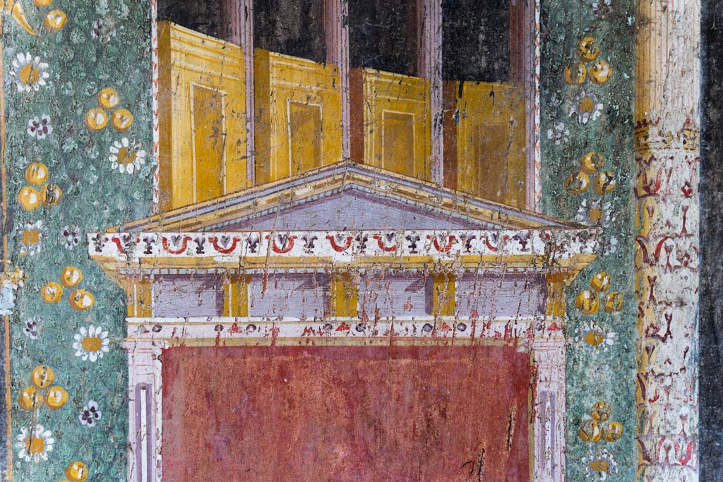 V.4.a Pompeii. January 2023.
Room ‘h’, painted detail from the upper part of the separating panel on east end of south wall. Photo courtesy of Johannes Eber.