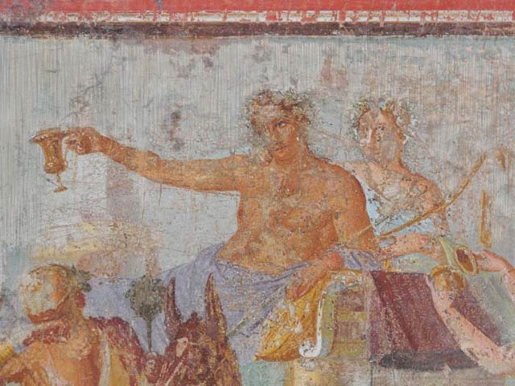V.4.a Pompeii. May 2015. Detail from central painting on south wall of tablinum.
Photo courtesy of Buzz Ferebee.