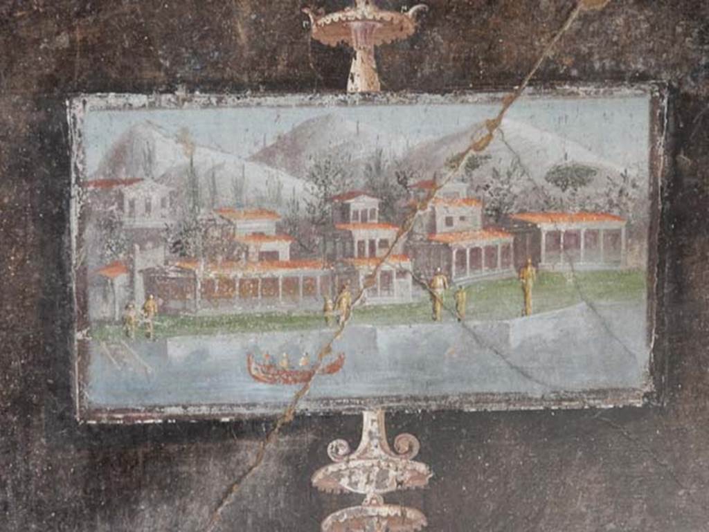 V.4.a Pompeii. May 2015. South wall of tablinum. Wall painting of architectural landscape with waterfront and boat. Photo courtesy of Buzz Ferebee.