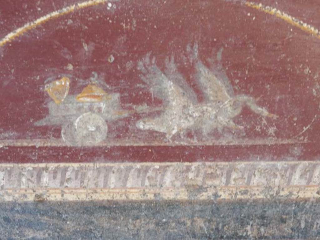 V.4.a Pompeii. May 2015. Detail two swans pulling chariot with cymbals, from predella at west end of south wall in tablinum. Photo courtesy of Buzz Ferebee.