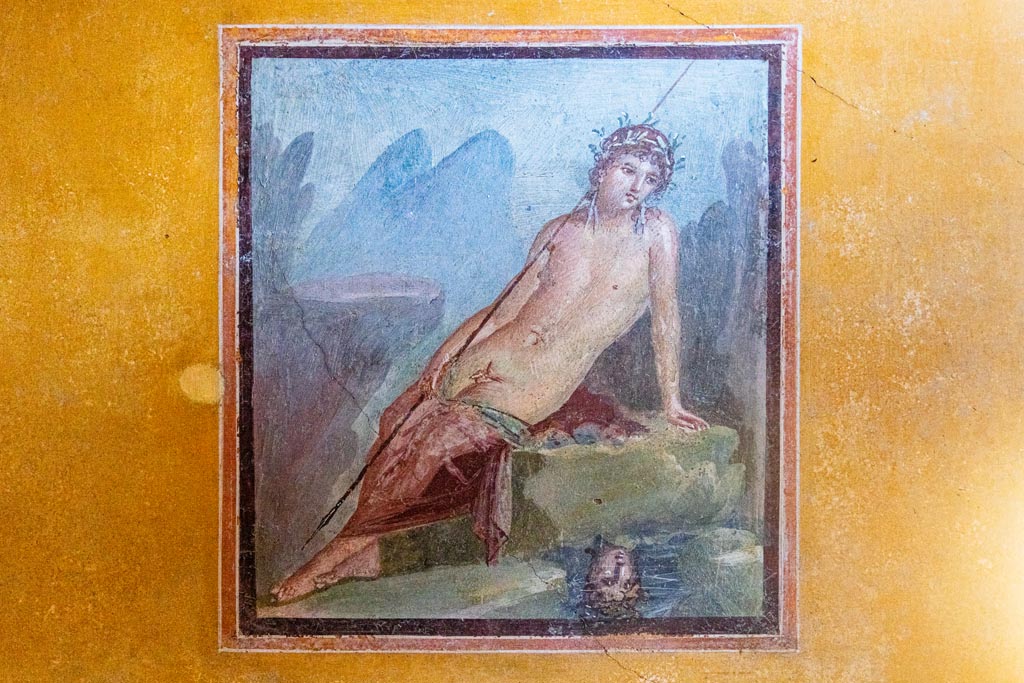 V.4.a Pompeii. October 2023.
Room ‘i’, north wall of cubiculum, with centre wall painting of Narcissus at the fountain. Photo courtesy of Johannes Eber.