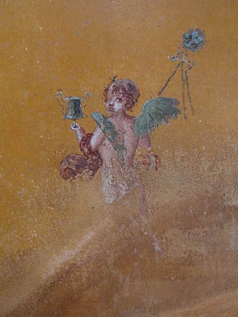 V.4.a Pompeii. May 2014. East end of north wall of cubiculum to right of tablinum — figure to right of painting of Narcissus at the fountain. Photo courtesy of Paula Lock.