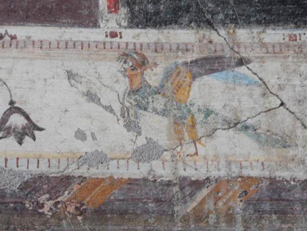 V.4.a Pompeii. May 2015. Detail from upper centre of west wall of cubiculum.
Photo courtesy of Buzz Ferebee.