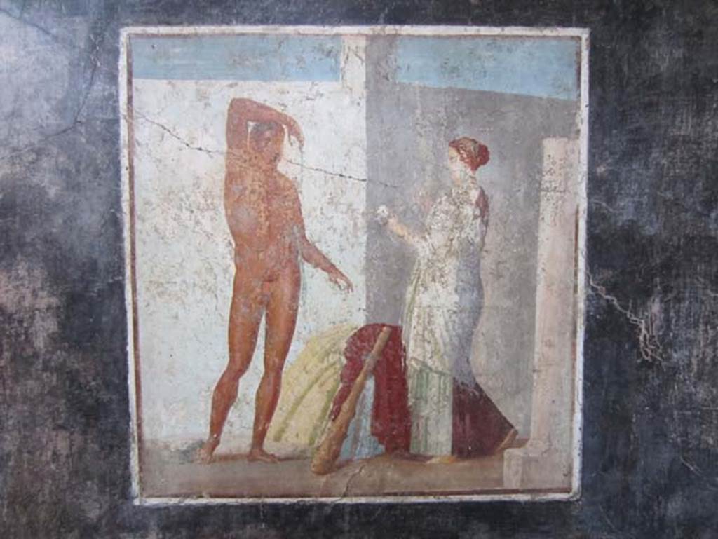 V.4.a Pompeii. March 2012. West wall of cubiculum on south side of atrium. Centre wall painting of Theseus and Ariadne at the entrance of the Labyrinth. Photo courtesy of Marina Fuxa.