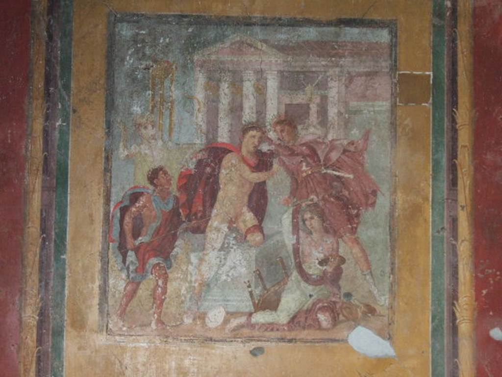 V.4.a Pompeii. December 2005. Winter triclinium, east wall. Wall painting of Orestes killing Neoptolemus at the altar before the Temple of Apollo at Delphi.