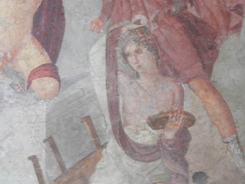 V.4.a, Pompeii. May 2018. Detail from central painting on east wall of winter triclinium. Photo courtesy of Buzz Ferebee.
