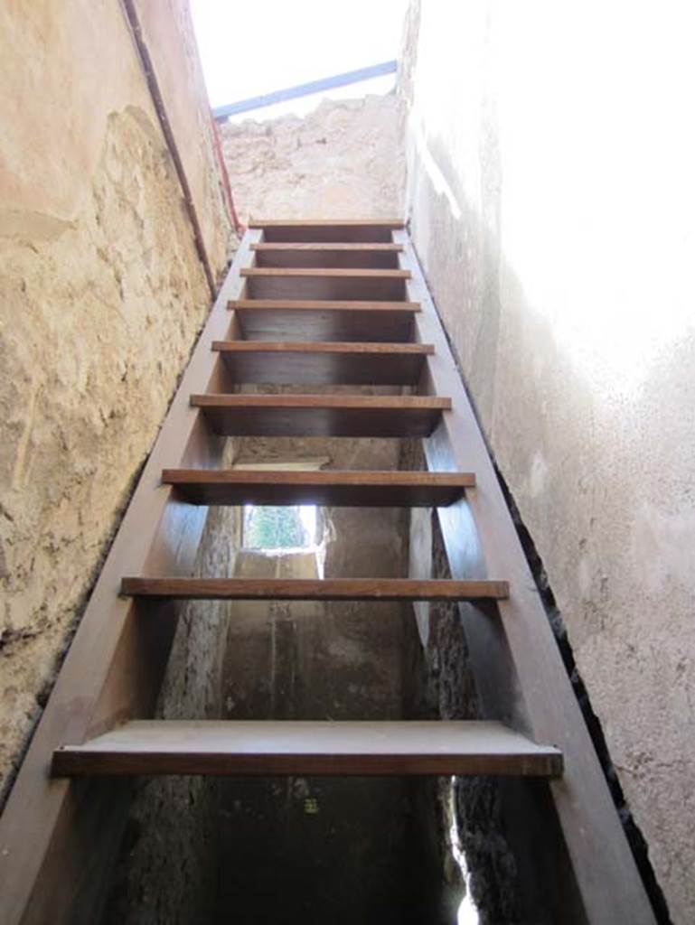 V.4.a Pompeii. March 2012. Reconstructed stairs to upper floor, in north-west corner of atrium. Photo courtesy of Marina Fuxa.