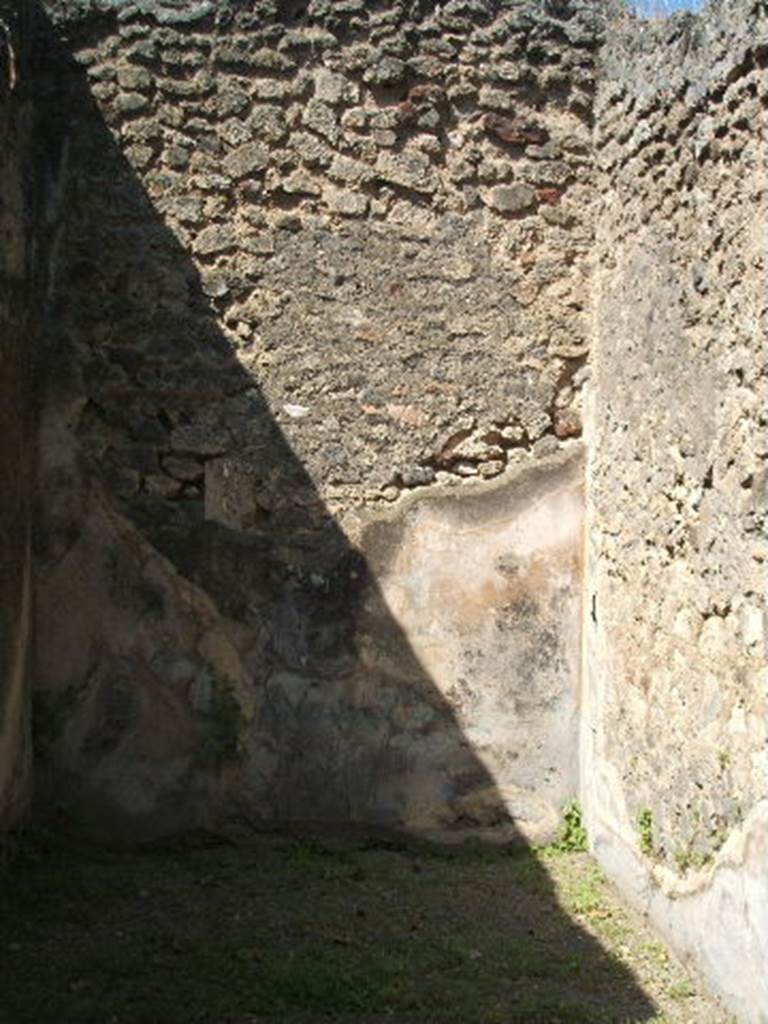 V.5.3 Pompeii. May 2005. Room 12. West wall.