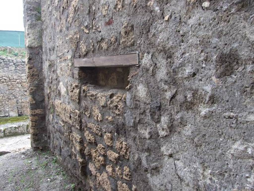 V.5.4 Pompeii. March 2009. West wall of shop.