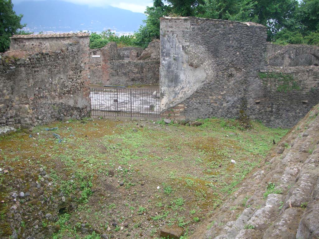 VI.1.1 Pompeii. May 2010.
Looking west from steps towards entrance onto Via Consolare on south side of Herculaneum Gate. Photo courtesy of Ivo van der Graaff.