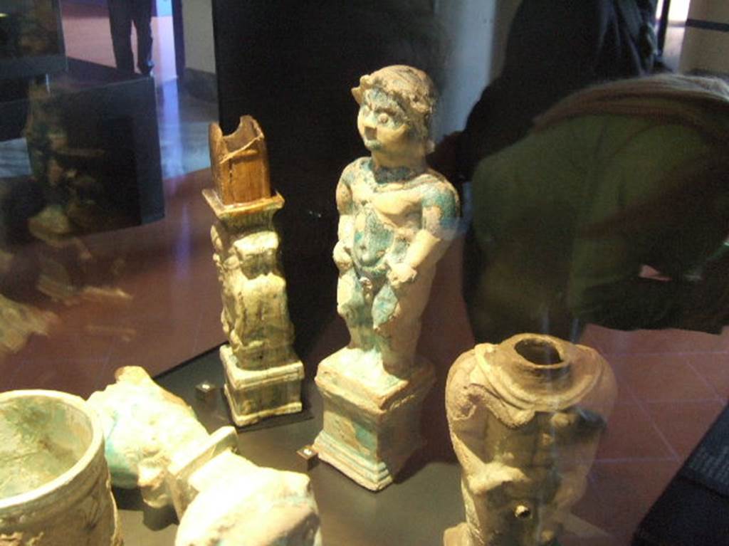Glazed terracotta statuette of Ptah-Pateco found in VI.1.2 on 6th October 1770. Now in Naples Archaeological Museum. Inventory number 22607.