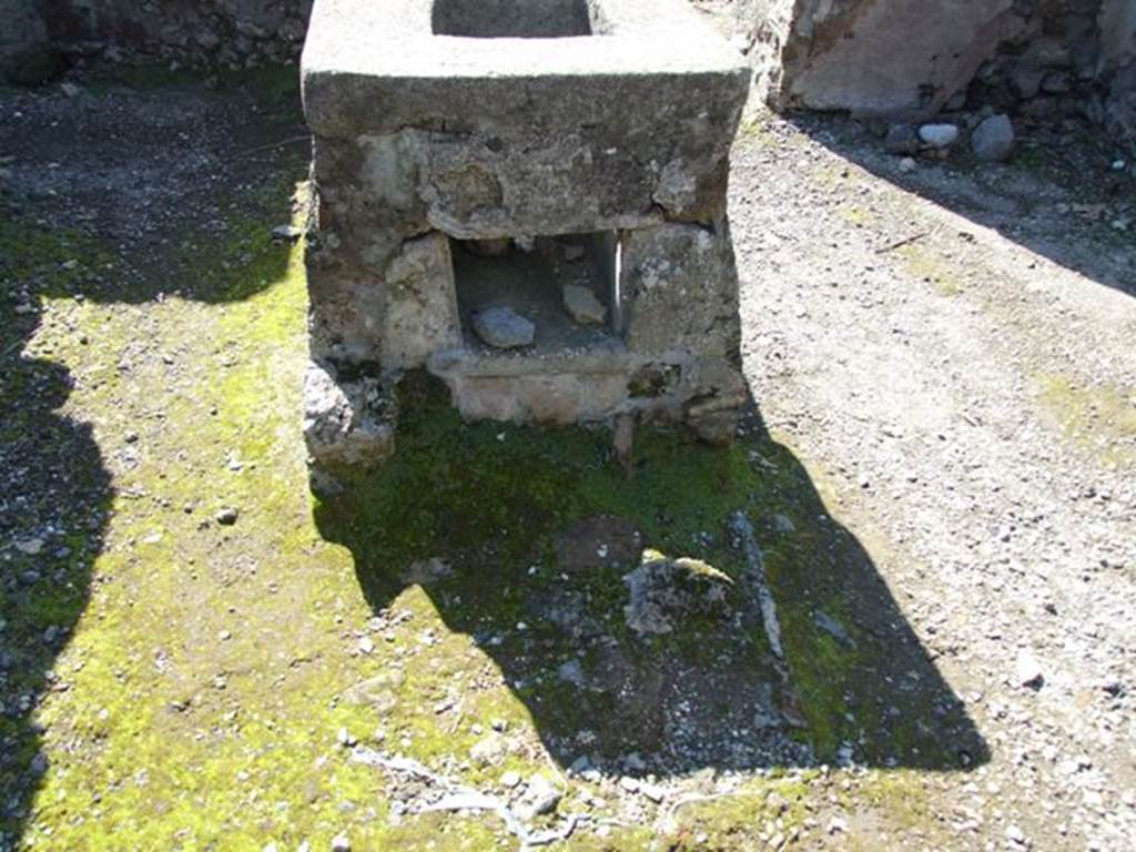 VI.1.2 Pompeii. March 2009. Hearth at end of counter.