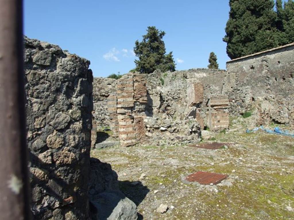 VI.1.4 Pompeii. March 2009. Three rooms on north wall with watering trough in centre.