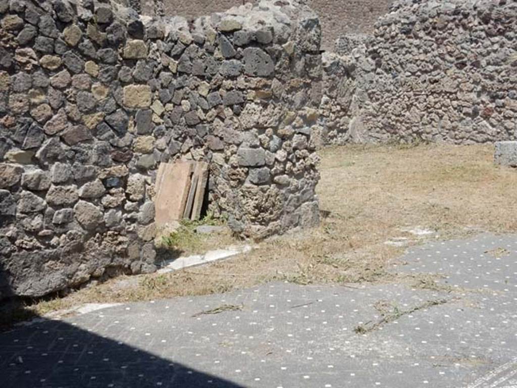 VI.1.7 Pompeii. May 2017. Doorways to rooms 1 and 2 on north side of atrium.
Photo courtesy of Buzz Ferebee.
