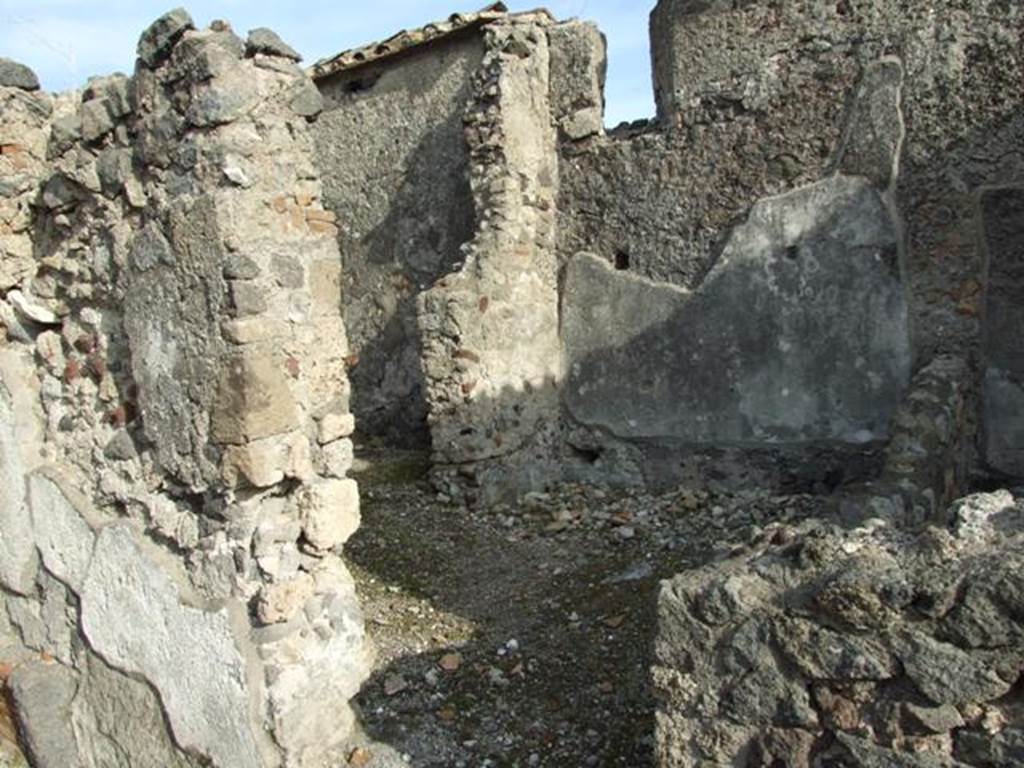 VI.1.7 Pompeii. December 2007. Doorway to room 25, baths area, with doorway to room 26 the caldarium, on left side.