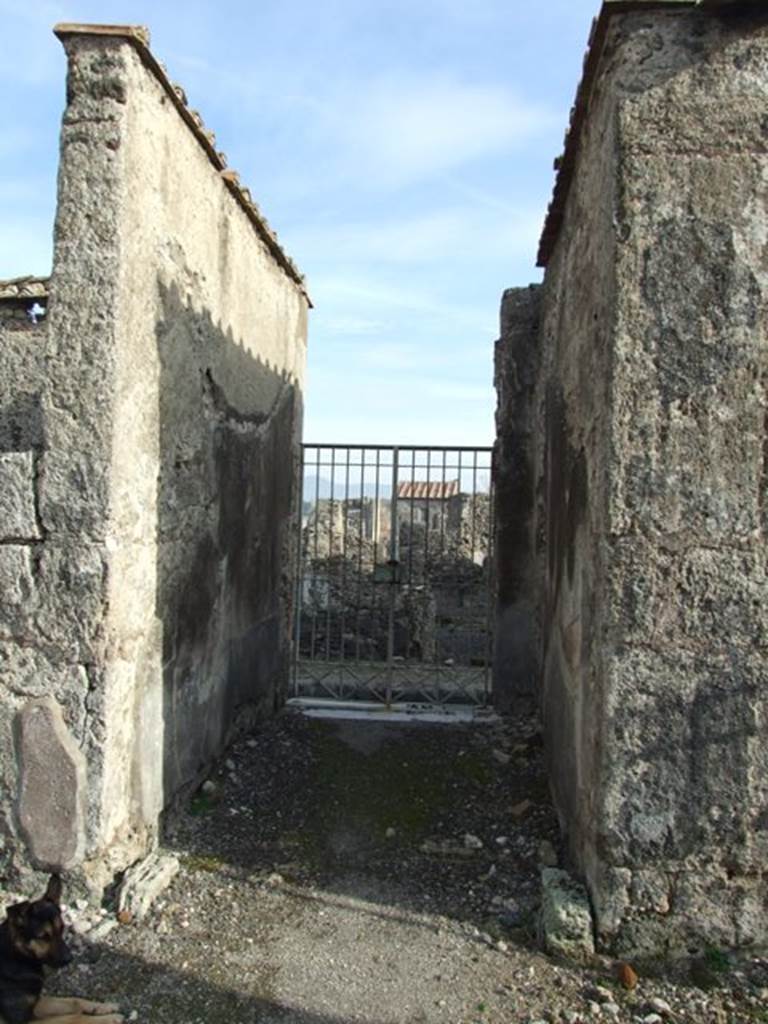 VI.1.7 House of the Vestals. Room 29 corridor leading to rear entrance at VI.1.25.