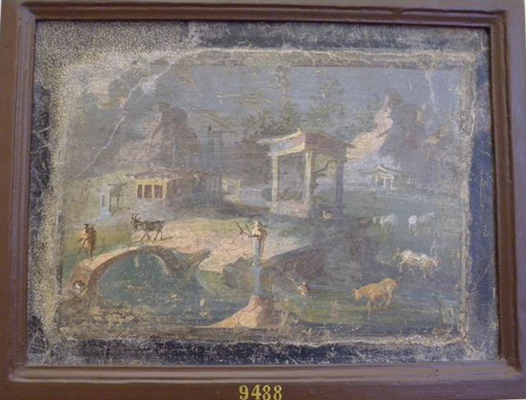 VI.1.7 Pompeii. Found 4th August 1787. Cut from wall on 6th November 1789. Wall painting of country scene with temple, statues, cows and goats. Now in Naples Archaeological Museum. Inventory number 9488. See Prisciandaro, R., 2006. Studio sulle provenienze degli oggetti rinvenuti negli scavi borbonici del regno di Napoli: Una lettura integrata, coordinata e commentata della documentazione Volume 1. Naples : Nicola Longobardi. (p.85).