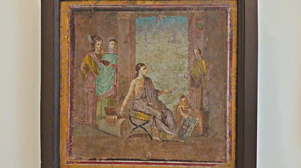 VI.1.10 Pompeii. Found 22nd June 1771 on east wall of room 9, room to south of garden.
Wall painting of a young woman painting a herm of Dionysus. Photo courtesy of Giuseppe Ciaramella, November 2018.