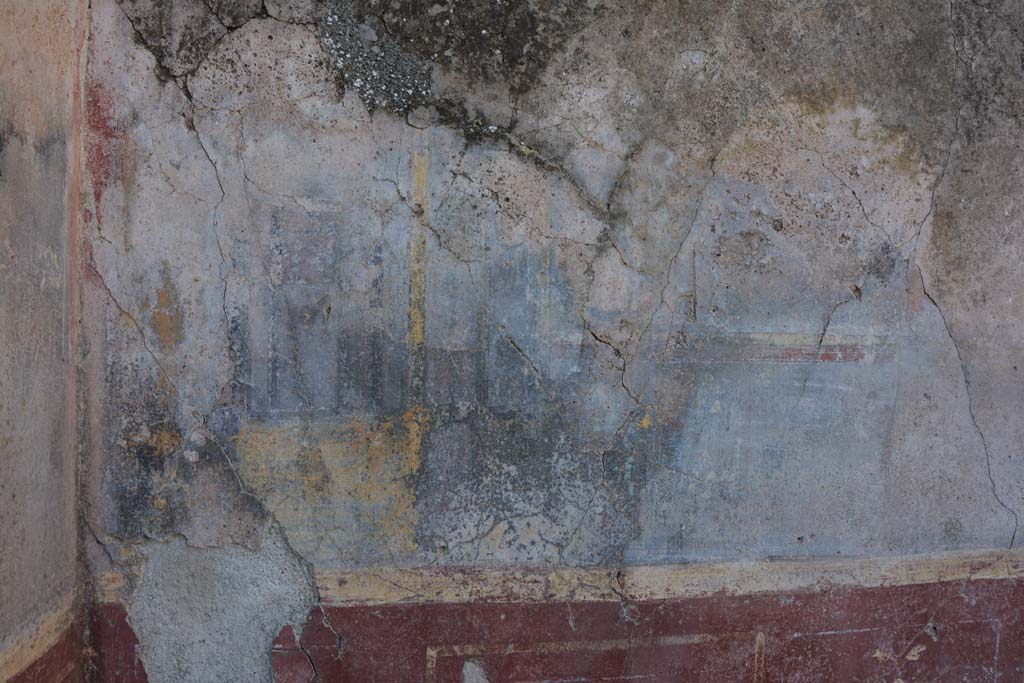 VI.2.4 Pompeii. March 2019.
Detail of painted plaster above zoccolo on west wall in south-west corner between the diaeta and the triclinium.
Foto Annette Haug, ERC Grant 681269 DÉCOR.