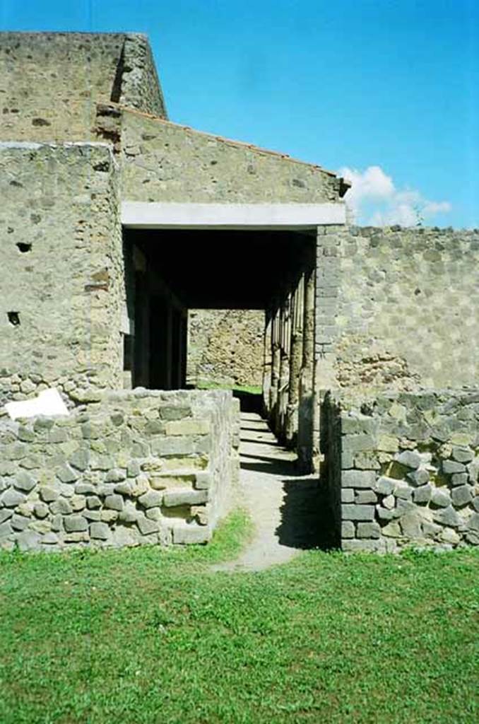 VI.2.4 Pompeii. June 2010. Looking north along garden portico, from near remains of kitchen, on left. Photo courtesy of Rick Bauer.