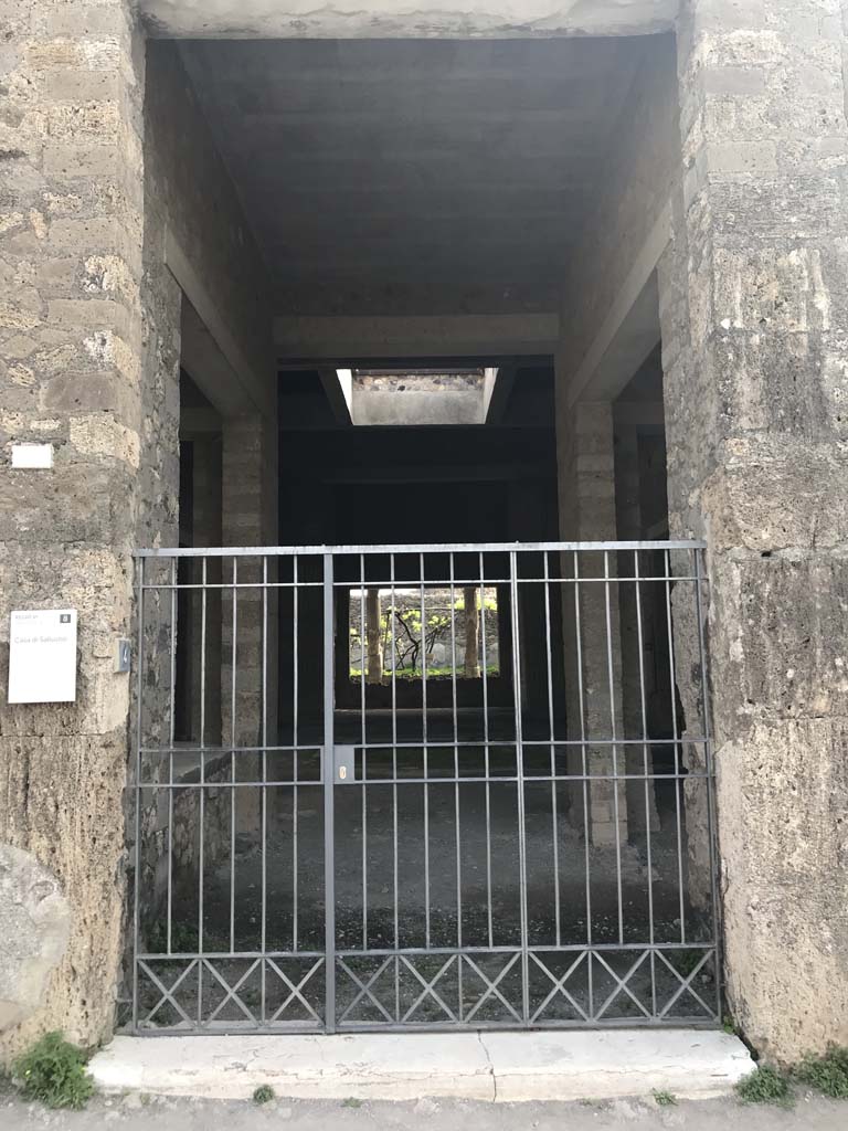 VI.2.4 Pompeii. April 2019. Looking east on Via Consolare towards entrance doorway.
Photo courtesy of Rick Bauer.