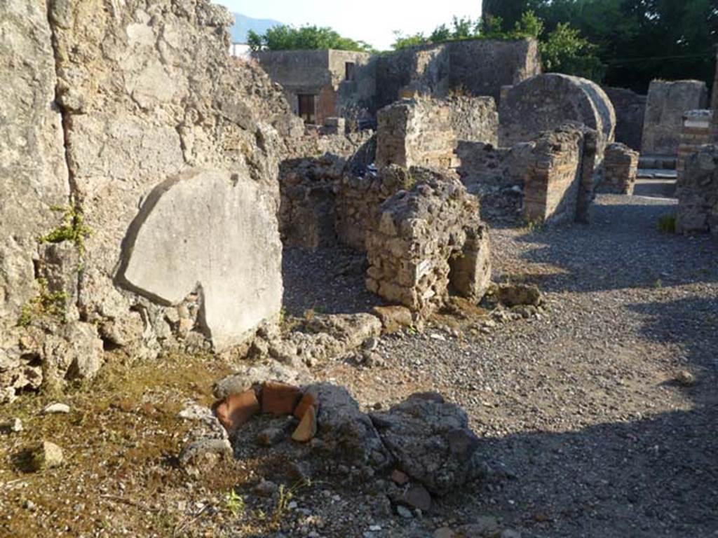 VI.2.10 Pompeii. May 2011. Looking south-west from garden area, towards doorway to triclinium on south side of tablinum. Photo courtesy of Michael Binns