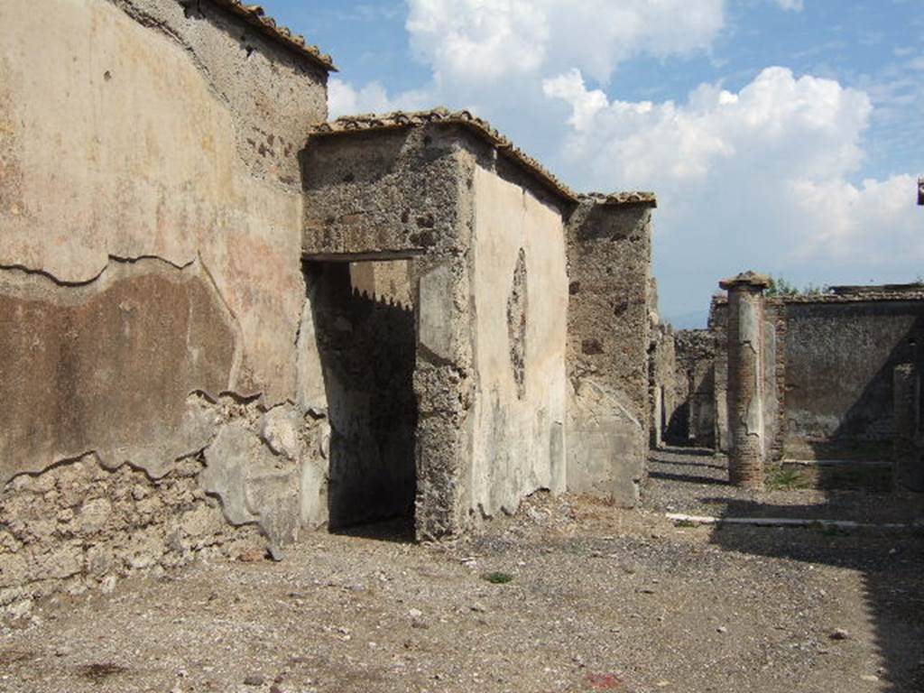 VI.2.16 Pompeii. September 2005. Looking east across atrium towards north wall of atrium and tablinum. The doorway led into a corridor which served as a passageway to the garden area.
See Pappalardo, U., 2001. La Descrizione di Pompei per Giuseppe Fiorelli (1875). Napoli: Massa Editore. (p.51)