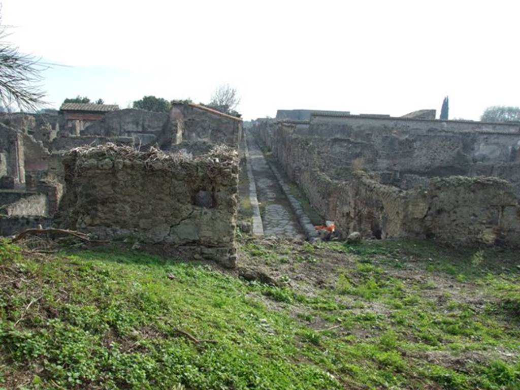 Looking south along Vicolo di Modesto from Tower XII. December 2007. VI.2.19 is on the right.