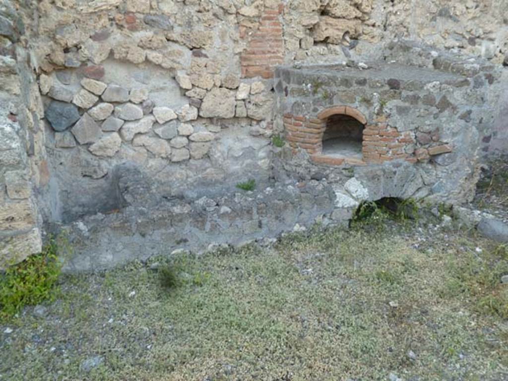 VI.2.26 Pompeii. May 2011. Looking north toward east side of workshop, with oven.