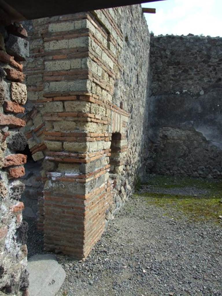 VI.3.3 Pompeii. March 2009. Room 5, Looking south along east wall, with small hatch from oven.