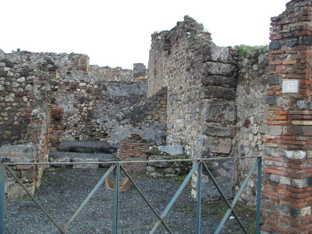 VI.3.15 Pompeii. December 2004. Looking east from Via Consolare.
According to CTP, CIL IV 108 was found here. Howvere, they say Zangemeister located it on the west side (left) of VI.3.20. See Van der Poel, H. B., 1983. Corpus Topographicum Pompeianum, Part II. Austin: University of Texas. (p.249) According to Epigraphik-Datenbank Clauss/Slaby (See www.manfredclauss.de), it read – C(aium) I(ulium) P(riscum) IIvir(um)
On the left can be seen the rear room of the shop, possibly a cubiculum.
On the right near the terracotta remains of a puteal, remains of another room with steps. In the area behind the steps would have been the latrine In the middle a corridor to the rear. At the rear would have been another room, a triclinium or workshop?. See Eschebach, L., 1993. Gebäudeverzeichnis und Stadtplan der antiken Stadt Pompeji. Köln: Böhlau. (p.164) See Pappalardo, U., 2001. La Descrizione di Pompei per Giuseppe Fiorelli (1875). Napoli: Massa Editore. (p.53)