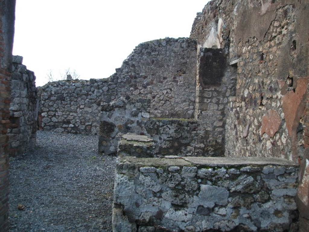 VI.3.24 Pompeii. December 2005. Looking west across counter towards large room for the customers, at the rear.