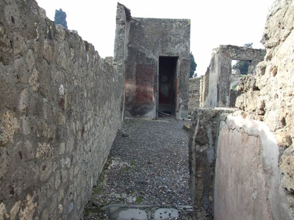VI.5.3 Pompeii. December 2007. Looking west from the corridor of room 7 across the south side of atrium to doorway to room 20. According to Breton, on the left would have been the wall with the painting of Neptune. According to Helbig, the atrium also contained a painting – the chariot of Artemis (246) as well as one of Poseidon or Neptune. (172)
See Breton, Ernest. 1870. Pompeia, Guide de visite a Pompei, 3rd ed. Paris, Guerin. See Helbig, W., 1868. Wandgemälde der vom Vesuv verschütteten Städte Campaniens. Leipzig: Breitkopf und Härtel. (246, 172) Schefold showed a black-and-white photo of this wall in Taf.101 of the book below. See Schefold, K., 1962. Vergessenes Pompeji. Bern: Francke.(p.122 and Taf.101)