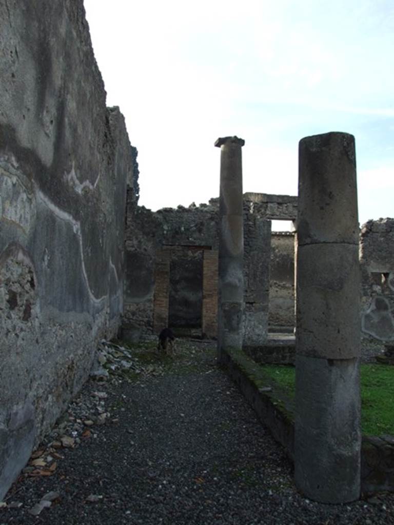 VI.5.4 Pompeii. December 2007. Looking west along the south side of atrium.