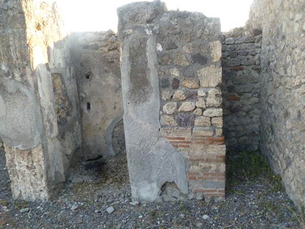 VI.5.8 Pompeii, May 2011. Doorways to rooms in north-west corner of atrium, looking west.
According to Fiorelli, the doorway on the left was a storeroom or cupboard, with stairs to upper floor.
See Pappalardo, U., 2001. La Descrizione di Pompei per Giuseppe Fiorelli (1875). Napoli: Massa Editore. (p.54)