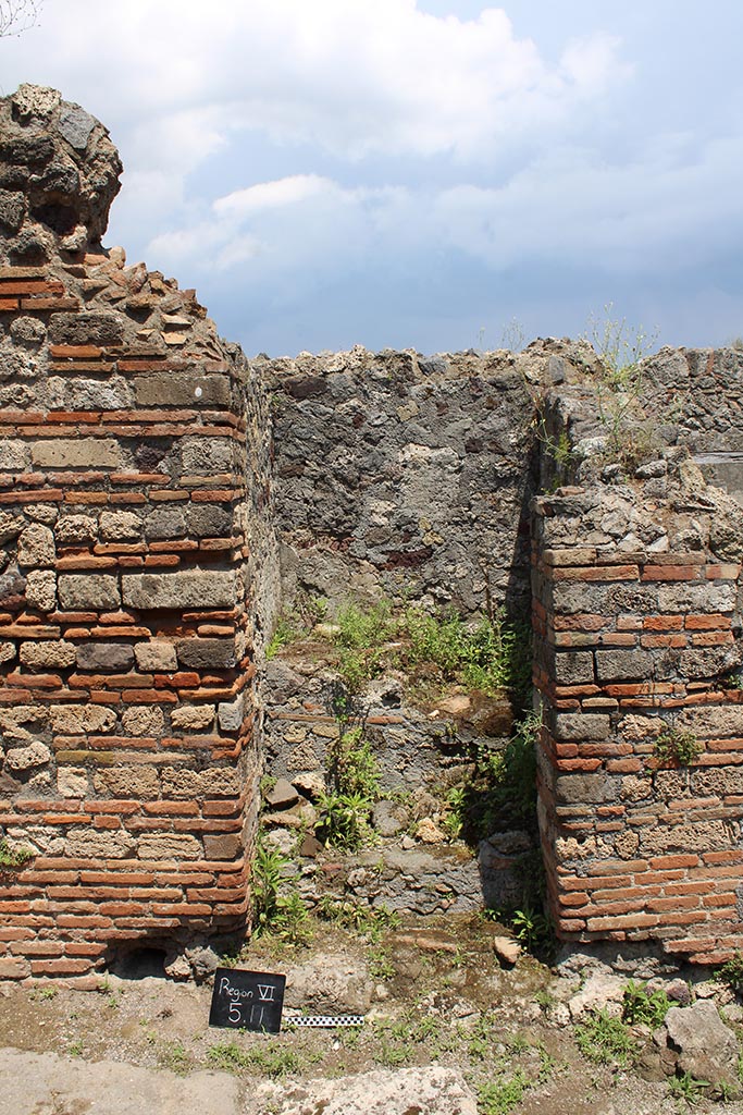 VI.5.11 Pompeii. June 2023. Stairs to an independent dwelling on the upper floor.
Photo courtesy of Jessica Mingoia.
According to CTP, the north-west corner of the house at VI.5.14 was excavated in 1817, as well as the pseudoperistyle of VI.5.10 and atrium area of VI.5.9.
The street wall at the north-west corner of the house at VI.5.14 collapsed and was reconstructed, which may provide the reason why Tascone, Mau and Eschebach, all indicated a rear doorway to VI.5.14, immediately south of this stairway, which, rightfully should be assigned a number.
This doorway was delineated by Russo’s map of 1817, and later by Mazois, Fiorelli – Sorgente, and Zangemeister (1865).
Today the number VI.5.11 is not in situ but it has been assigned by the SANP to this staircase.
See Van der Poel, H. B., 1981. Corpus Topographicum Pompeianum, Part V. Austin: University of Texas, (p.196-7).
