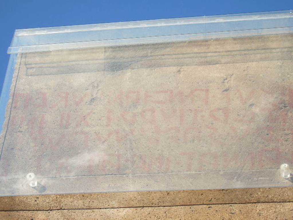 Remains of red painted Oscan inscription known as eítuns on pillar between VI.6.3 and VI.6.4. December 2005.
According to Antonini, found here was the eítuns known as Vetter 24 –
eksuk. amvianud. eítuns
anter. tiurri. XII. ini. ver(u)
sarinu. puf. faamat
m(a)r(a(hi)s). aadiriis. v(iibieis)
See Antonini, R. (2007): Quaderni di Studi Pompeiani: Associazione Internazionale Amici di Pompei, 1/2007: (p.47-113)
According to Dobbins & Foss (editors), the translation of this eítuns was -
Through this lane they ought to go
Between tower XII and
The Sarina gate, where
Mara Adirius, the son of Vibius, commands.
See Dobbins, J & Foss, P., 2008. The World of Pompeii. New York: Routledge. (p.21 and note 16)