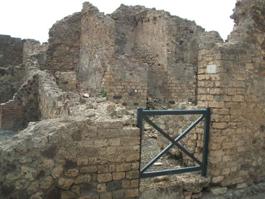 VI.6.6 Pompeii. May 2005. Looking west to entrance that led to the stairs to an independent dwelling on the upper floor. In the night of 14th-15th September 1943, a bomb fell near here destroying three rooms with four dividing walls and the perimeter wall, part of VI.6.7. See Garcia y Garcia, L., 2006. Danni di guerra a Pompei. Rome: L’Erma di Bretschneider. (p.76)