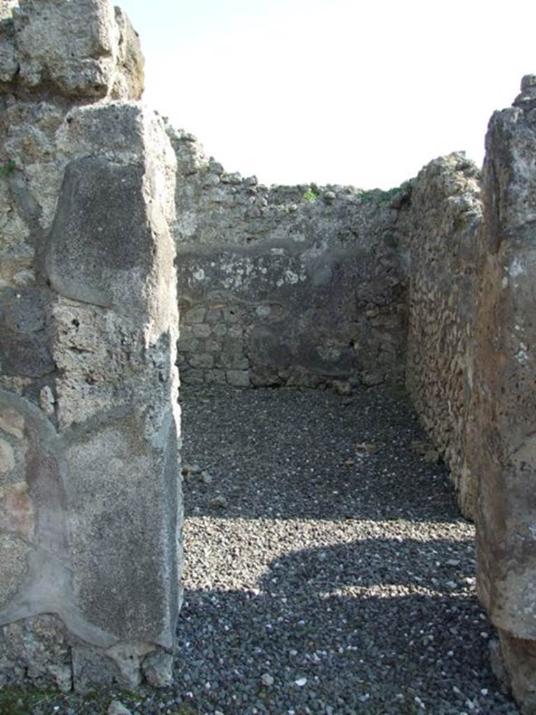 VI.7.3 Pompeii. March 2009. Doorway to Room 8. Looking south.