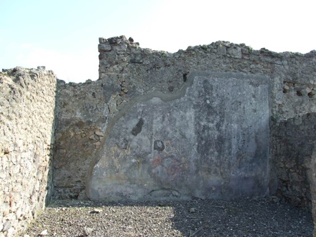 VI.7.3 Pompeii. March 2009. Room 9, south wall of oecus.
According to PPM
– the zoccolo was discoloured: the middle zone of the wall had a red central panel with yellow side panels, which may have been separated by candelabra (?). According to Mau, the wall was III Style.
See Carratelli, G. P., 1990-2003. Pompei: Pitture e Mosaici 4. Roma: Istituto della enciclopedia italiana, (p.367)