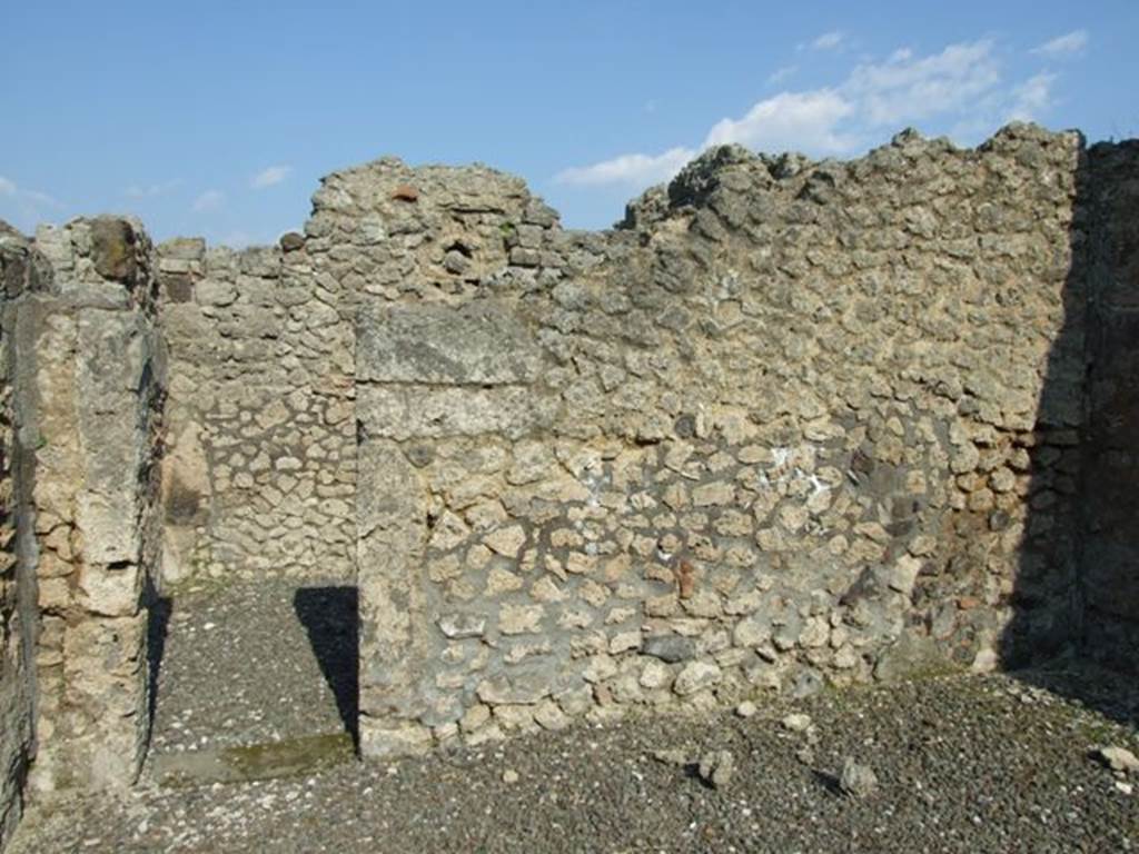 VI.7.3 Pompeii. March 2009. Room 9. Oecus. East wall with Doorway to Room 8.