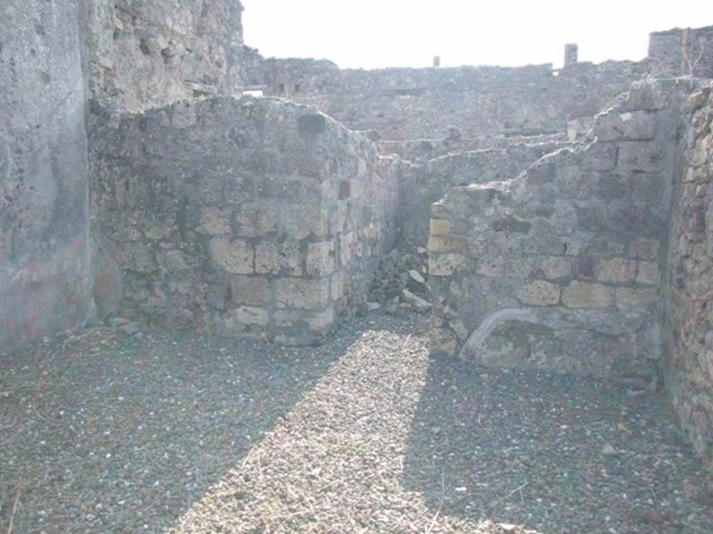 VI.7.3 Pompeii. March 2009. Room 9. Oecus. West wall, with doorway to small Room 10.