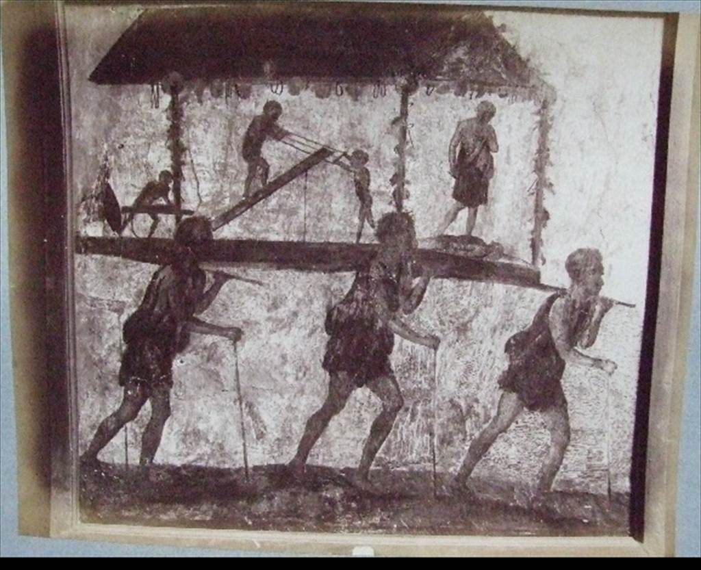 VI.7.8 Pompeii. Wall painting of the Procession of the Carpenters. Originally found on pilaster between entrances VI.7.8 and VI.7.9. Old undated photograph courtesy of the Society of Antiquaries, Fox Collection.